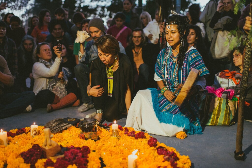 Heart of marigold petals and candles laid on the street for Día de Muertos in San Miguel de Allende